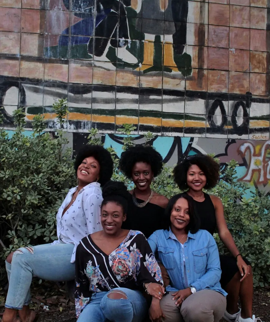 A group of friends smiling together